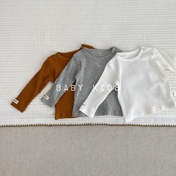 
2026 Spring and Autumn Infants and Toddlers Versatile Long-Sleeved Pullover T-Shirts for Male and Female Babies Solid Color Pit Stripe Stretch Bottoming Shirt Tops