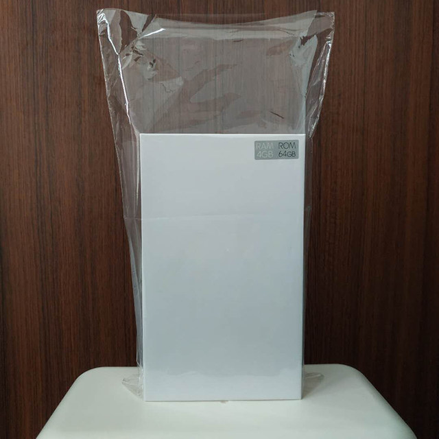 Mobile phone box heat shrinkable film packaging box sealing machine ...