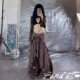 Find European and American large size retro style irregular wood ear design long skirt for women, vacation new long skirt