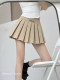 Low -waist college wind band bow pleated skirt miu is a girl sweet girl anti -walking half -body mini skirt
