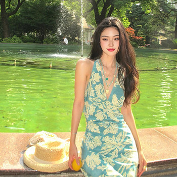 ຮູບຖ່າຍແບບຣີສອດແຄມທະເລໃສ່ເສື້ອແຂນຍາວຄໍແອວສີຟ້າພິມເສື້ອ v-neck backless ກະໂປງຍາວ