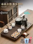 Bộ khay trà và bộ ấm trà theo phong cách Bakelite hiện đại của Zhenxi dành cho phòng khách gia đình Bàn trà kung fu bằng gỗ nguyên khối hoàn toàn tự động giá bàn trà điện Bàn trà điện