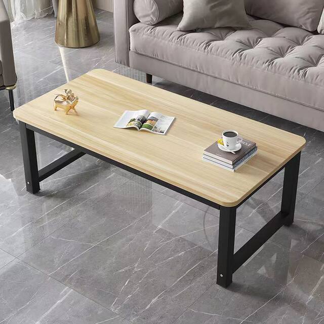 Black living room coffee table side table 50 high 60 long