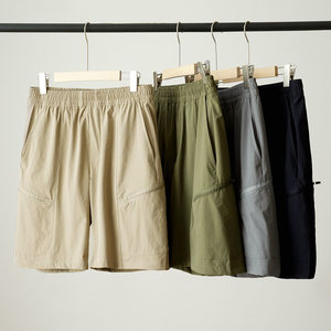 Lightweight and quick-drying men's large-size woven shorts sports and casual 5-point pants solid color mid-pants summer style men's clothing
