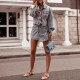 Spot KSUBI high waist light blue cotton asymmetrical breasted slim high legs long wrap mini denim skirt