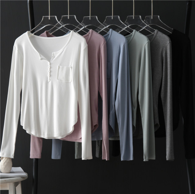 Mao -edge pocket arc swinging long -sleeved T -shirt female summer 2025 new slim round neck thread cotton bottom shirt