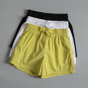 Anti-exposed sports shorts for women in summer running, fitness yoga shorts quick-drying loose tennis casual hot pants
