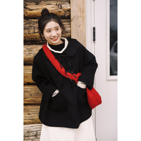 
Gu Moss’ favorite black wool coat of the year, cape-like lapel silhouette double-sided woolen mid-length winter coat