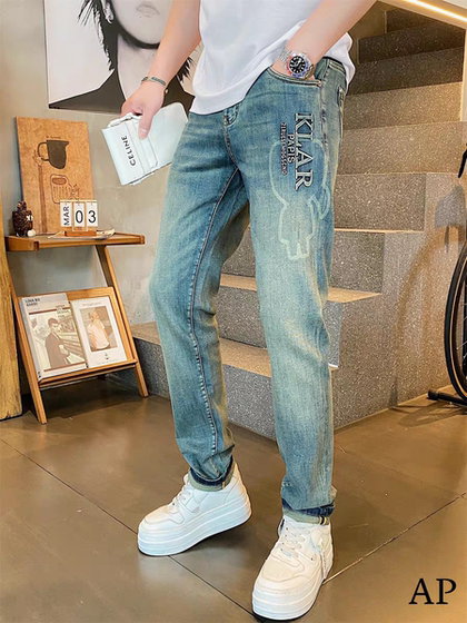 
European goods 2026 spring new high-end blue letter embossed slim fit small-foot jeans for men, trendy and versatile trousers