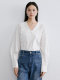 Disenis 2025 spring new simple commuter style white long-sleeved V-neck shirt for women