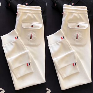 
High-end European pineapple pattern men's casual pants autumn and winter elastic tying sports sweatpants versatile slim-fitting trousers