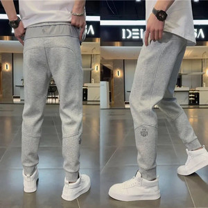 Spring and summer new men's sports casual pants and sweatpants, fashionable and versatile windproof leggings, spliced with popular harem pants