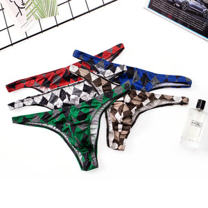 Men's small triangle half -bag hip sexy underwear personality printing ice silk without trace U convex low waist Bikini men's pants