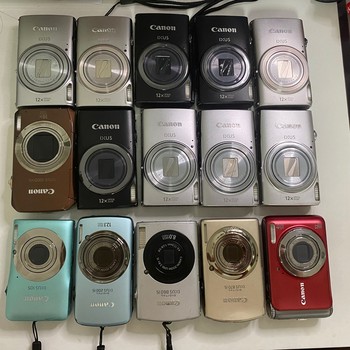 Canon CCD retro cold white leather telescopic lens camera