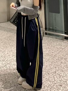 
American sports spliced ​​striped casual pants for women in summer elastic waist loose small hot girl tying wide-leg pants