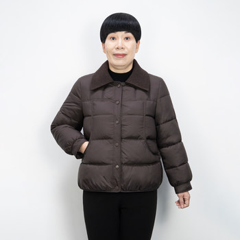 
Mother in her 50s keeps warm and comfortable winter coats and cotton-padded clothes