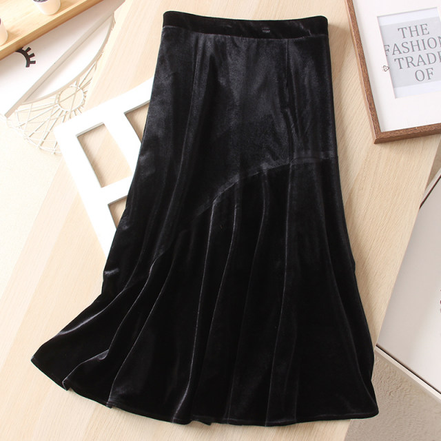 Autumn irregular symmetrical design sense high waist velvet fishtail skirt black high waist thin and thin middle long girl skirt