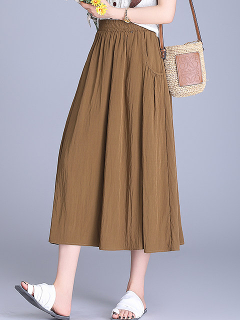 Asymmetric casual skirt Comfortable loose skirt 2025 summer new high-waist A-line skirt mid-length pocket skirt