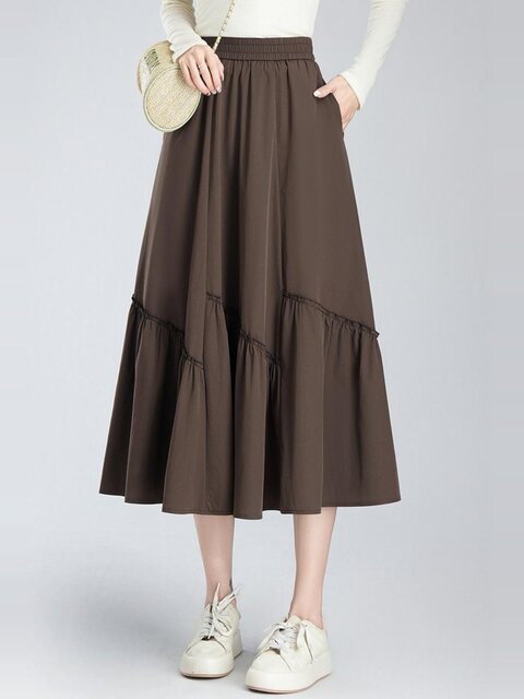 Single-layer casual skirt women's large hem skirt 2025 new summer design sense splicing mid-length pocket a-line skirt