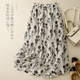 Retro printed cotton and linen skirt for women in summer thin elastic waist slimming mid-length drooping flowing a-line umbrella skirt
