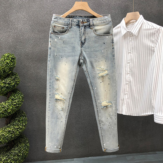
Design-sensing ink-splashed ripped jeans men's trendy brand stretch slim feet 2024 summer high-end men's nine-point pants
