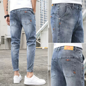 
Jeans men's trendy slim-fitting small feet pinch pants 2025 summer new elastic and handsome versatile casual pants