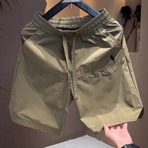 
2025 summer men's quick-drying breathable five-point pants punched casual pants versatile simple embroidered shorts beach pants