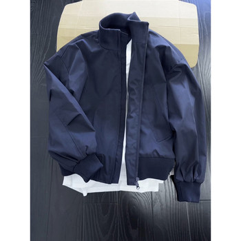 Navy blue stand collar bomber jacket for men in autumn