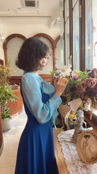 
2022 new sweet milk tea first love gentle temperament fake two-piece dress bow commuting high waist pure color