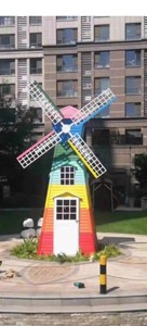 
Factory direct sales anti-corrosion wood windmill Dutch landscape outdoor rotating kindergarten decoration flower sea pastoral scenic spot windmill