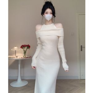 Amy’s store foreign trade quality knitted autumn and winter new off -shoulder fake two -piece one -shoulder, knitted fishtail long skirt
