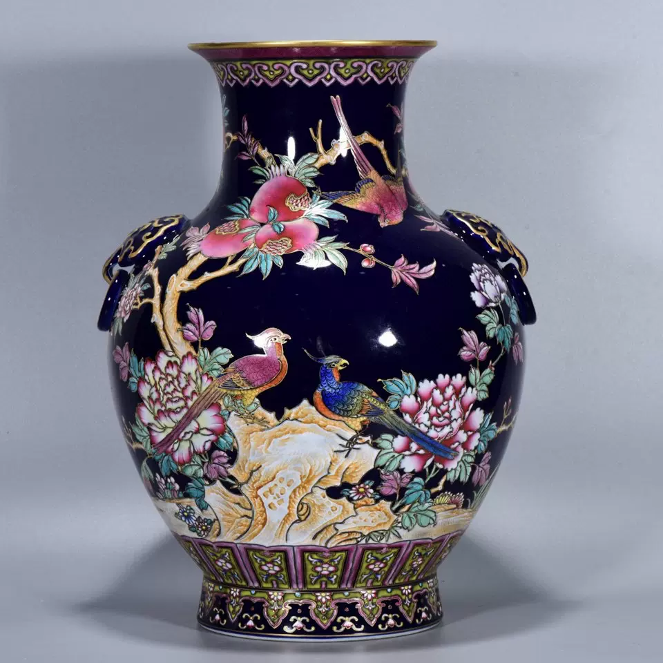 A SUPERB AND RARE CARVED CELADON-GLAZED 'PEONY' VASE