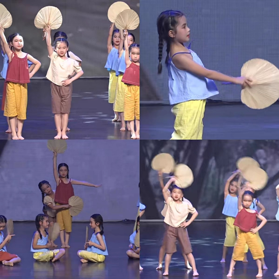 
Summer performance costumes with waving cattail fans. Shake and shake to Grandma Bridge. Children's dance performance costumes. Children's nostalgia.