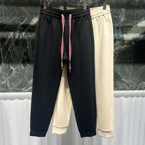 
European high-end autumn men's casual pants, small feet slim, modal trendy brand solid color ties sports trousers, wardrobe pants