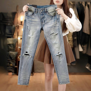 
Autumn and winter original high-end retro light blue hole patch embroidered jeans men's slim feet elastic trendy brand