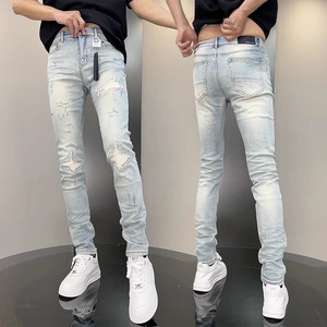 
Autumn light-colored ripped jeans for men's trendy brand slim feet elastic scraping patch high street casual trousers
