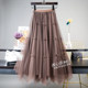 Autumn and winter bow irregular gauze skirt skirt autumn and winter women's 2025 two sides wearing mesh skirt pleated skirt long skirt
