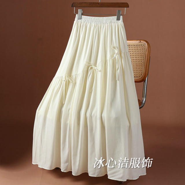 Bow irregular skirt 2025 spring and summer new high-waisted lace-up A-line skirt with wood ears mid-length skirt