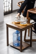 Trung Quốc bàn trà bên tủ hộ gia đình nhỏ bàn trà ấm đun nước tích hợp bàn cà phê sofa phòng khách bên bàn gỗ nguyên khối khay trà nhỏ
