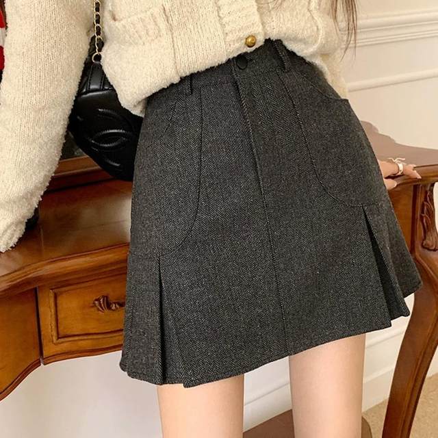 Large size autumn and winter new wool pleated skirt age-reducing A-line short skirt anti-lighting and slimming the belly-covering college style skirt