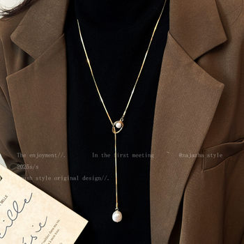 Women's golden pearl long pendant necklace
