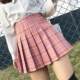Pleated skirt for women in spring and summer jk white a-line skirt new Korean style high-waist short skirt autumn and winter large-size plaid skirt
