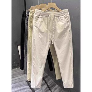 Men's summer trendy British style solid color versatile trousers Korean style slim nine-point pants handsome trendy casual pants