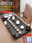 bàn trà điện kamjove Wujin đá khay trà trà hộ gia đình hoàn toàn tự động tất cả trong một ấm đun nước kungfu đá lớn và nhỏ bàn trà trà biển bàn trà điện gỗ hương Bàn trà điện