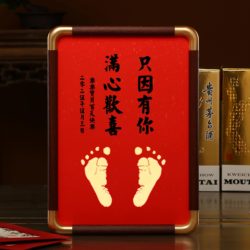 Newborn's 100th birthday commemorative hand and foot prints