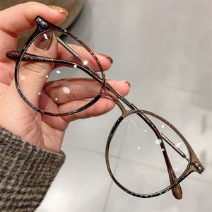 
Ultra-light retro cold brown myopia anti-blue S-light black frame glasses frame for women without makeup artifact brown eye frames round