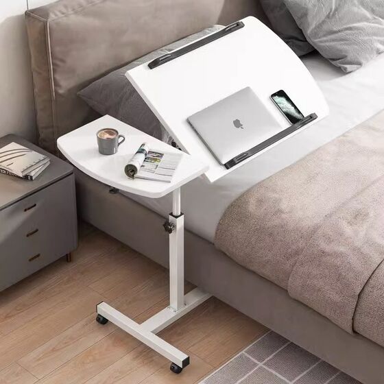 The computer table on the bed can move the bedroom table to lift the desk of the bedroom table and the home notebook to learn the folding table small
