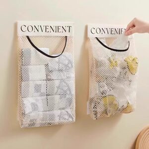 Kitchen garbage bag storage artifact wall -mounted large -capacity storage bag plastic bag storage magic pocket pocket