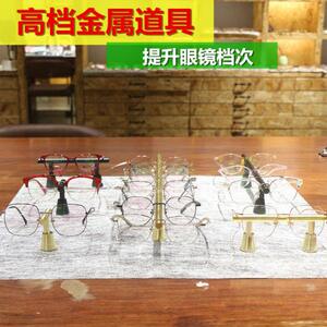 
Light luxury gold myopia bracket metal soil display black display stand props glasses decoration luxury sunglasses