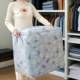 a Household seasonal fabric storage bag Large capacity portable zipper quilt storage bag Wardrobe space-saving clothes bag
